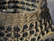 Close-up of a woven basket with a textured pattern