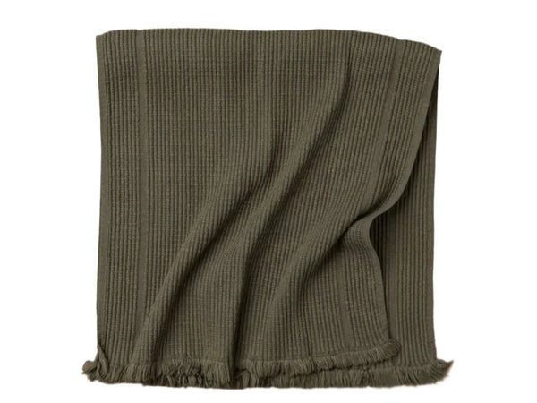 A green olive-colored vintage wash towel with a short terry weave, part of the Saardé Olive Bath Mat collection.