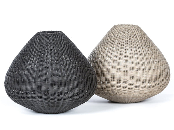Two pendant outdoor lighting fixtures, one in black color and one in beige, with a textured surface.