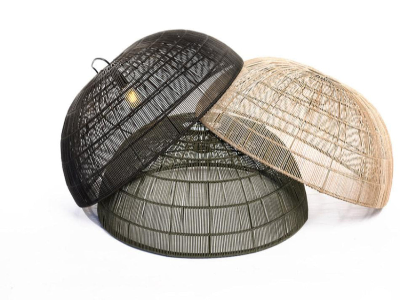 Two outdoor pendant lights with a conical shape, one in black and one in a light beige color, resembling a traditional Bali design.