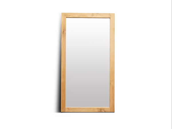 Rectangular mirror with a wooden frame on a white background